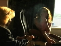 Aged doxy enjoying a cigar and deepthroating her stud